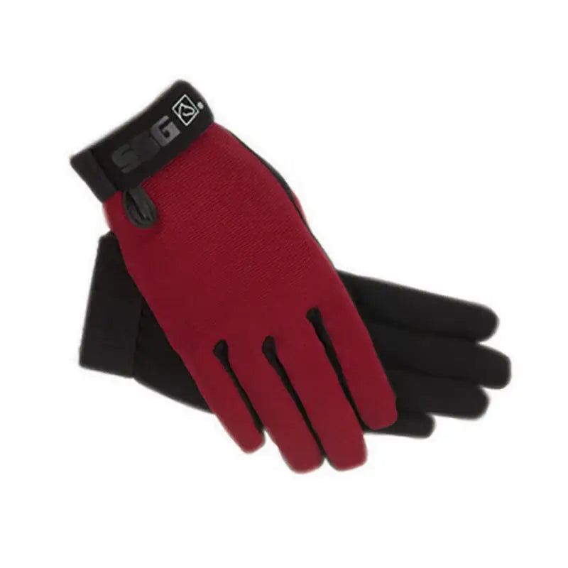 Red and black ssg riding gloves with snug wrist strap and logo designed for all weather childs riding gloves