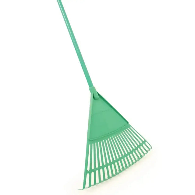 Green plastic stable rake with long handle and evenly spaced tines for use in large plastic stable maintenance