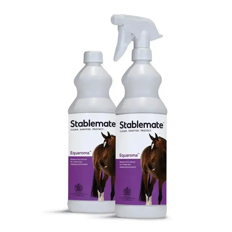 Two white plastic spray bottles of stablemate equaroma with purple horse labels featuring relaxing herbaceous fragrance to banish unpleasant smells