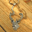 Silver stags head pewter key ring with detailed textured face and antlers measuring 11cm including chain