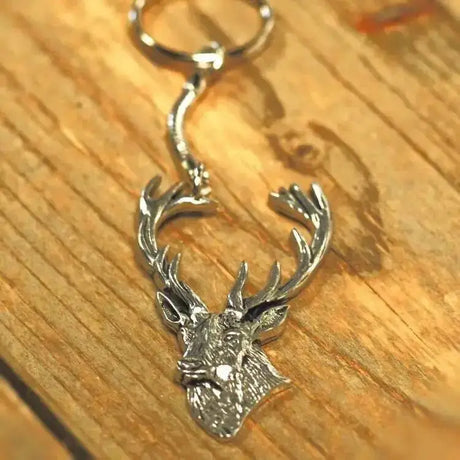 Silver stags head pewter key ring with detailed textured face and antlers measuring 11cm including chain