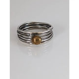 Steed silver wired multi-strand ring with a twisted silver band and a central brass ball detail
