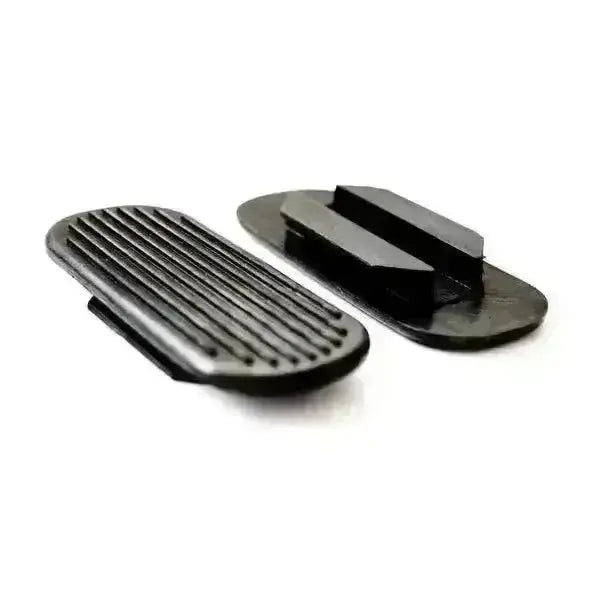 Black plastic phone stand with textured grip and adjustable clamp featuring stirrup treads rounded rubber design