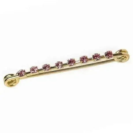 A delicate stock pin diamante gold plated bar with sparkling pink diamante crystals for stylish accessorizing
