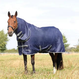 Navy blue stormx empra combi turnout rug with reflective trim and adjustable straps for horses in storm conditions