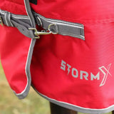 Red stormx combi turnout rug with gray trim and metal buckle from the stormx empra 300 combi turnout line