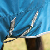 Zipper detail on the blue StormX Empra 50 Turnout Rug for equestrian use