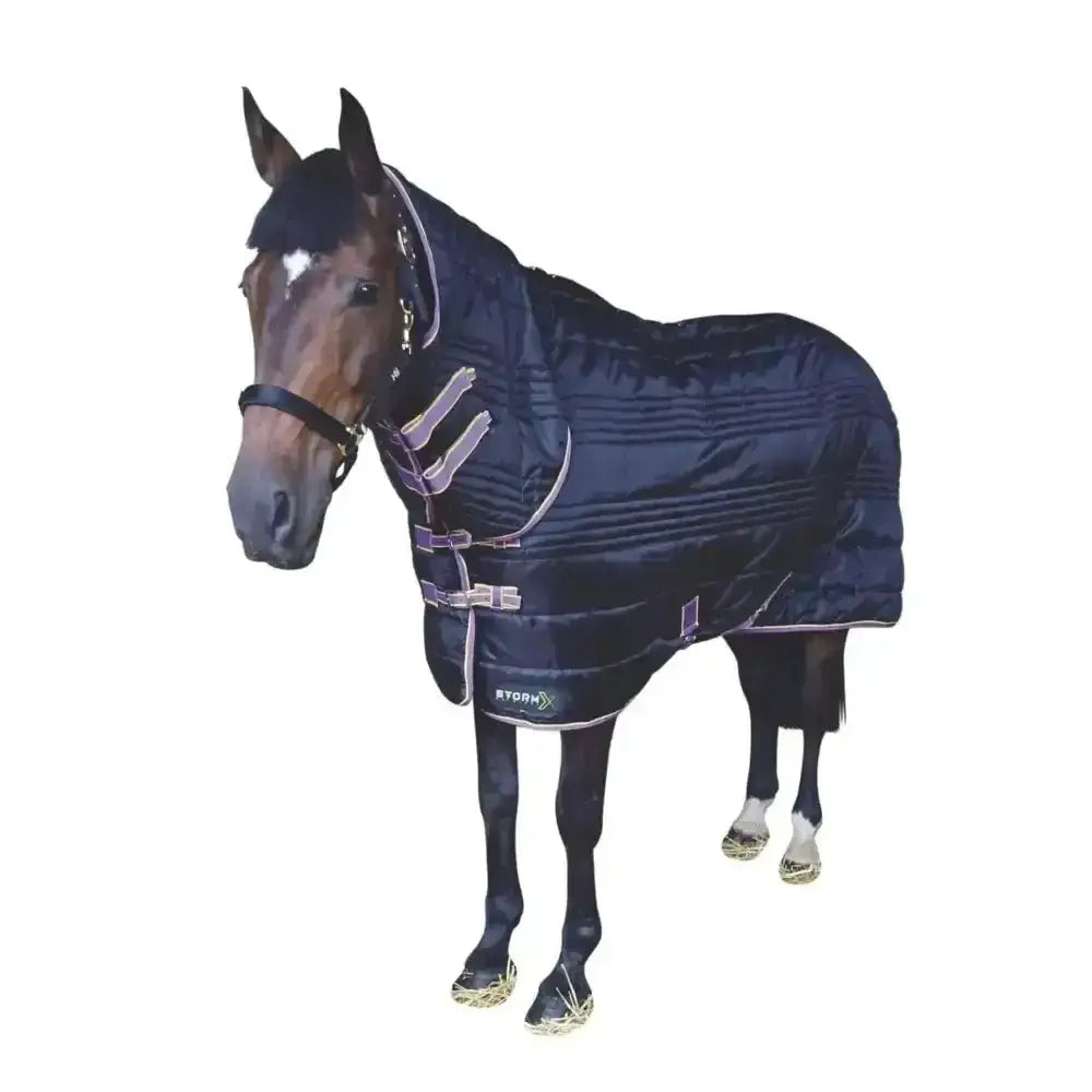 Dark navy blue quilted stormx original 200 combi stable rug with silver reflective trim and adjustable straps by rydon