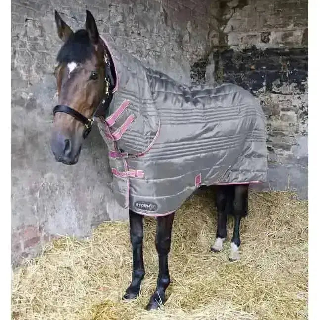 Gray quilted stormx original 300g combo stable rug with pink trim and black brand patch for horses