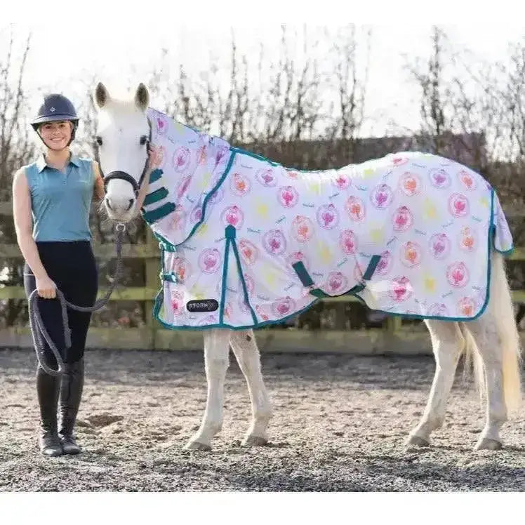 White horse blanket from stormx original thelwell collection with pink and yellow hearts teal trim rounder combi fly rug