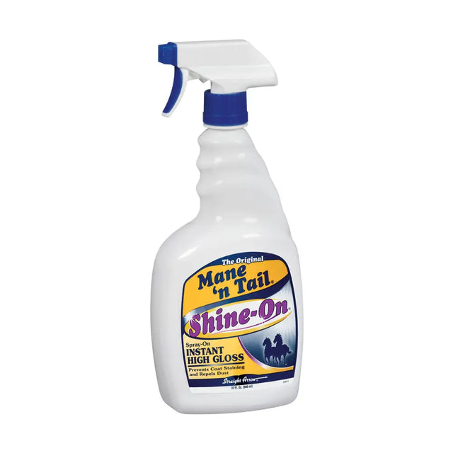 White plastic conditioning finishing spray bottle with blue trigger labeled straight arrow mane n tail shine on