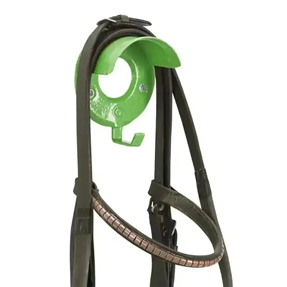 Dark brown leather horse bridle with copper beaded browband hanging on bright green stubbs bridle brackets hooks outstanding model