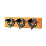 Black metal stubbs bridle rack with three round cowl hooks mounted on light brown wooden board s203