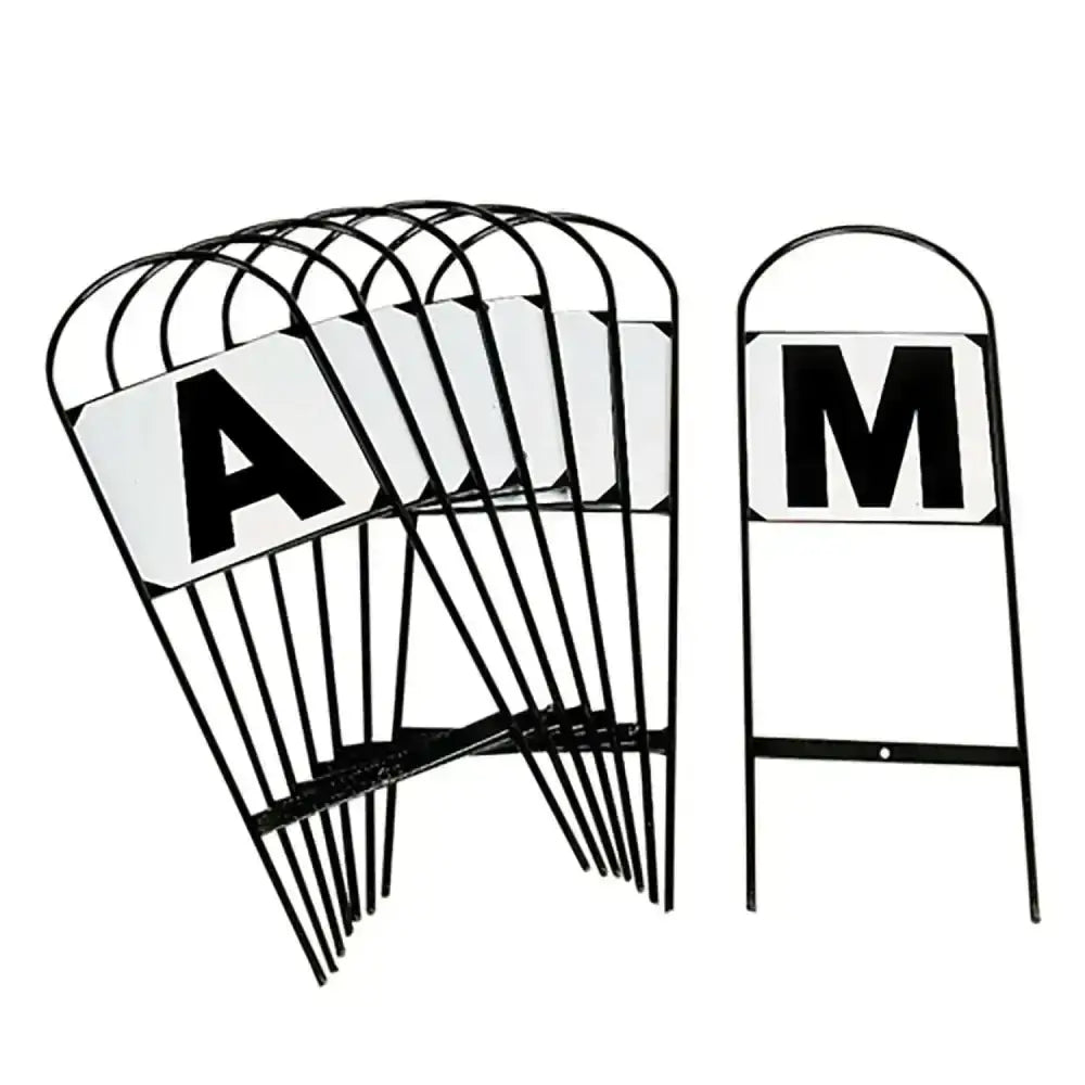 Black metal dressage markers from stubbs field push pack with white letters a and m and handy hoop frame
