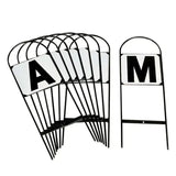 Black metal dressage markers from stubbs field push pack with white letters a and m and handy hoop frame