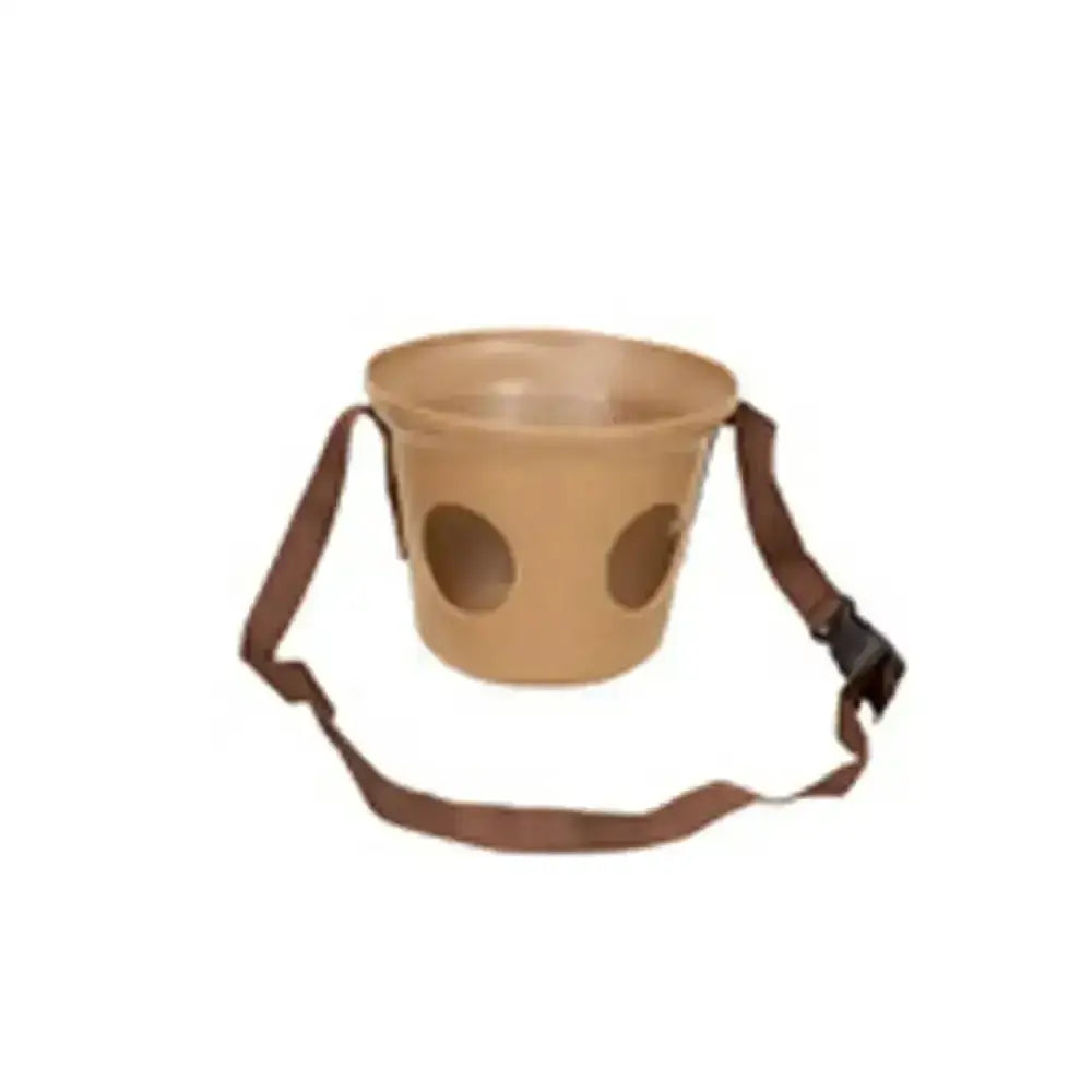 Tan plastic stubbs grazing muzzle with two circular cutouts and brown adjustable strap for horse tack use