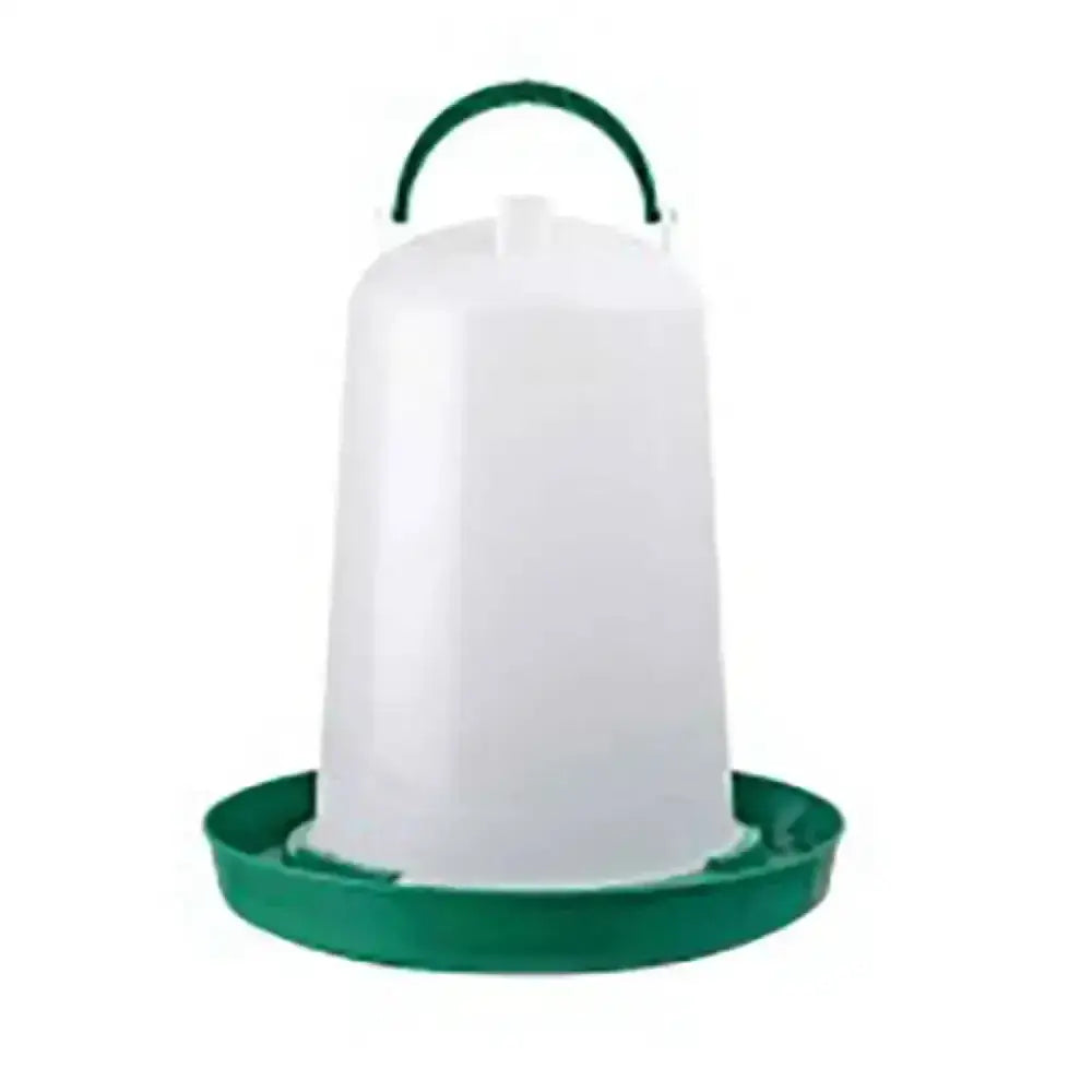 White plastic poultry feeder with green handle and base for stubbs horseshoe stable nameplates simple setup