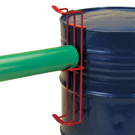 Red metal stubbs jump cups wall bracket js33 with two hooks securing green pipe on dark blue industrial drum