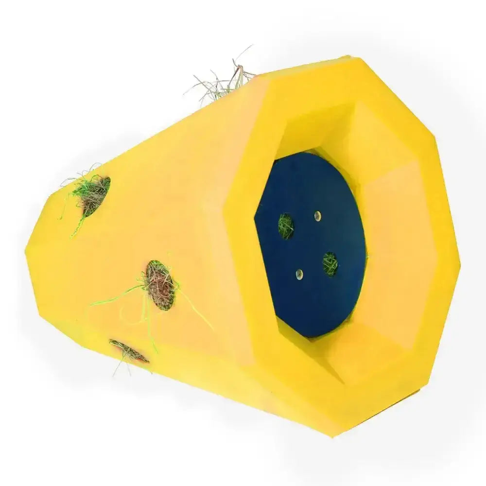 Bright yellow octagonal stubbs lidded hay roller horse toy shaped like a cheese wedge filled with hay for pets