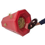 Red octagonal stubbs lidded hay roller pony with black handle pulled open to show straw inside