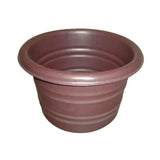 Brown plastic stubbs stable water tub with ribbed texture and flared rim for effective stable water tub use