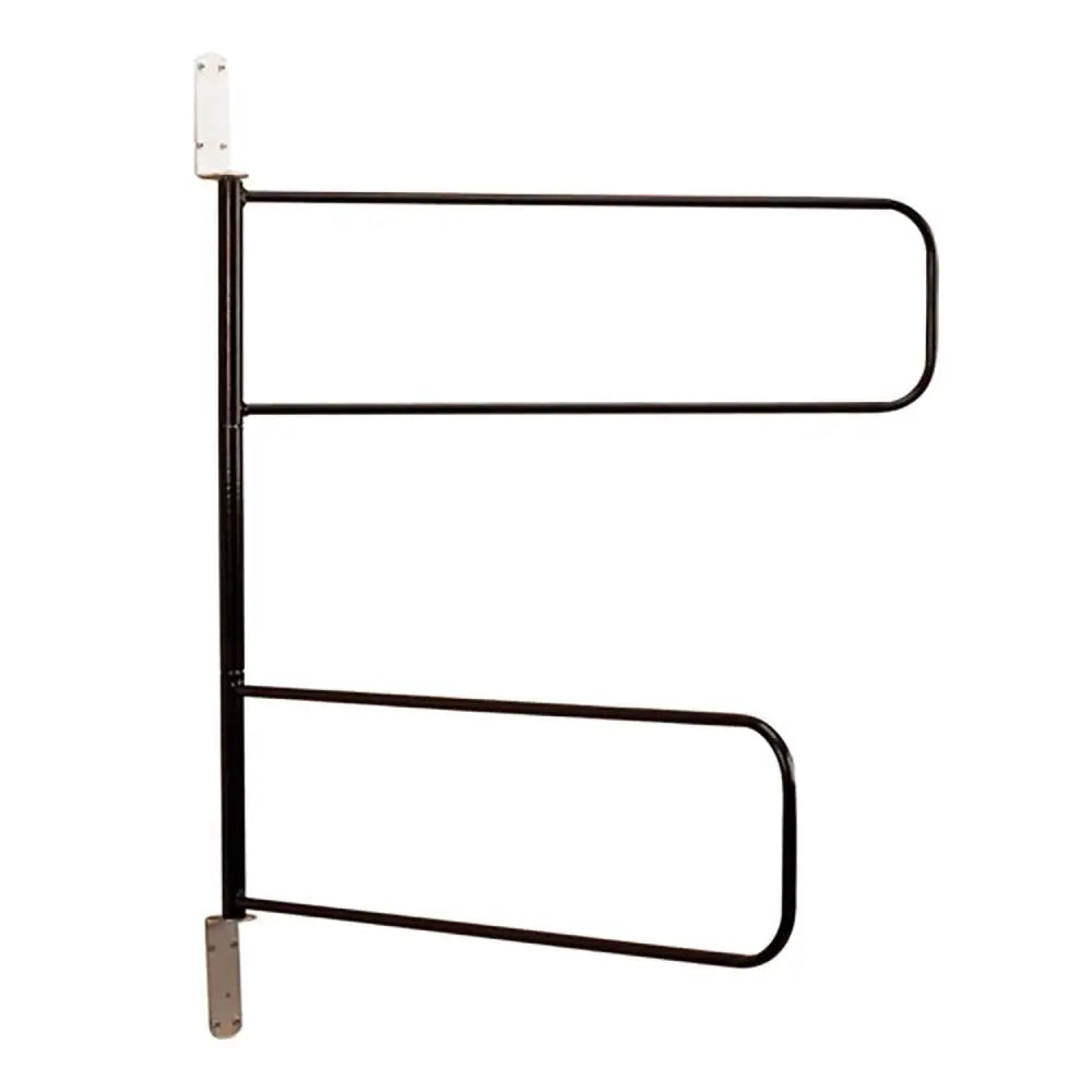 Black metal horse trailer gate with white mounting brackets on the back side of stubbs swinging numnah rack