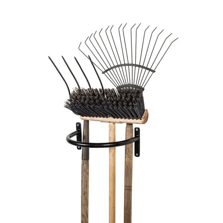 Black metal long handled rake with wooden handle on black wall rack stubbs tool hoop s299 product shot