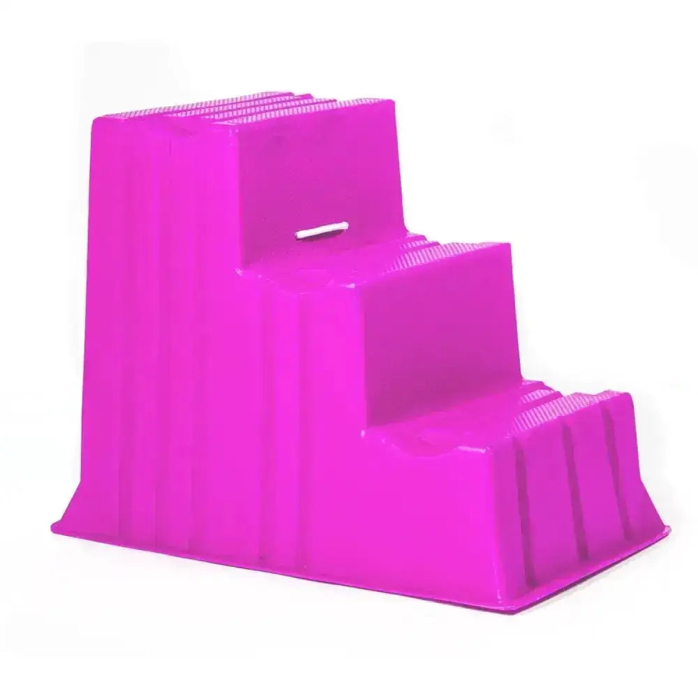 Vibrant pink plastic two-step stubbs up and over mounting block s523 with textured ribbed surfaces and masterful design