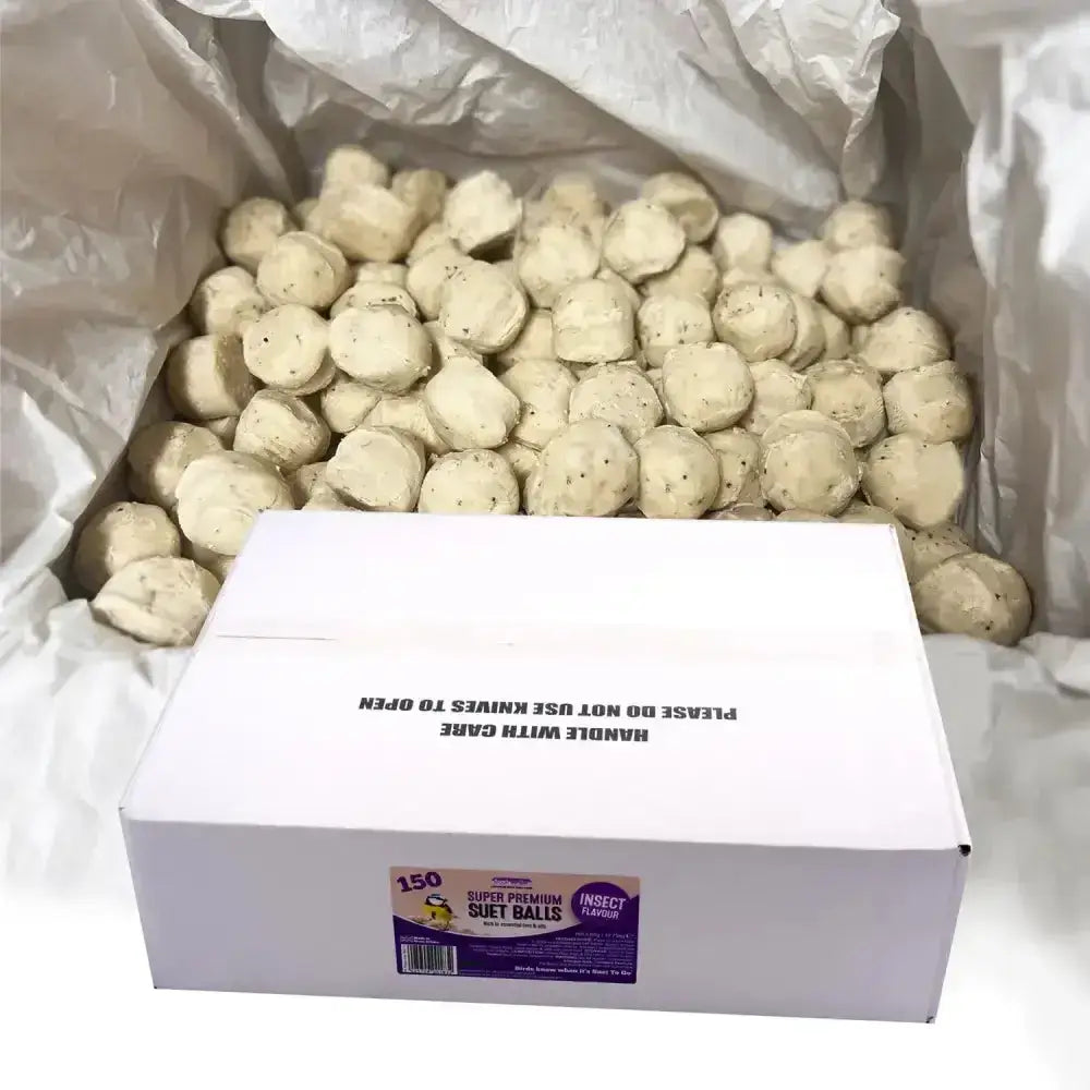 A white box of super premium suet balls insect with a purple yellow sticker holds pale beige premium suet balls in paper