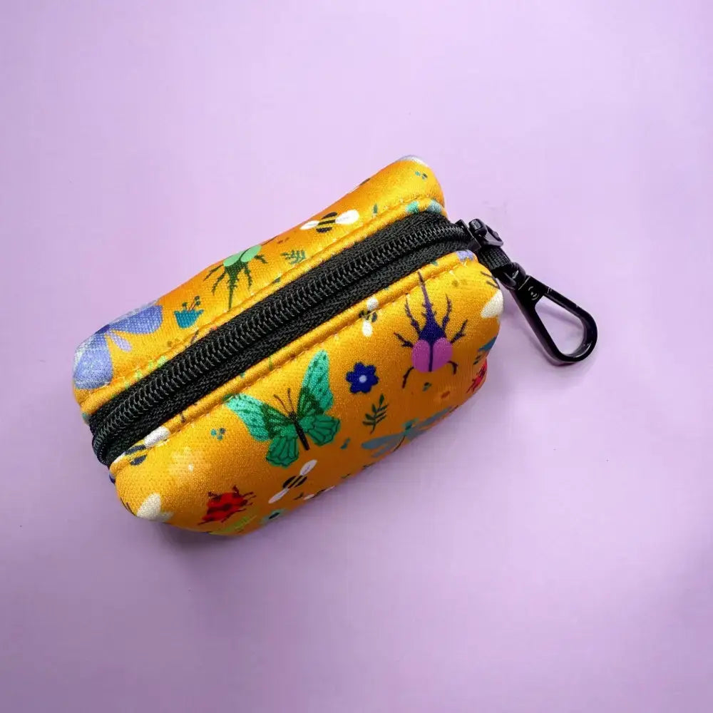 Summer buzzin mustard yellow fabric poo bag holder with butterfly and beetle pattern for easy dog walks