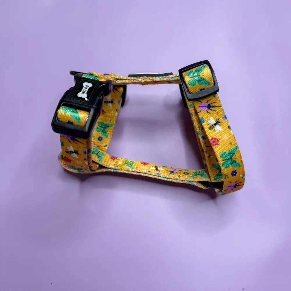 Yellow summer buzzin puppy strap harness with playful butterflies bees flowers on woven fabric and black buckles