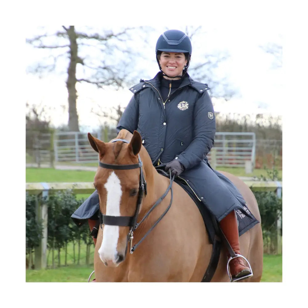 Supreme Products Active Junior Show Rider Waterproof Coat Black/Gold Junior 1 Outdoor Coats & Jackets Barnstaple Equestrian Supplies