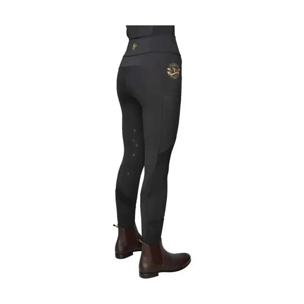 Black supreme products active rider leggings with gold embroidered waistband and thigh for a flattering fit
