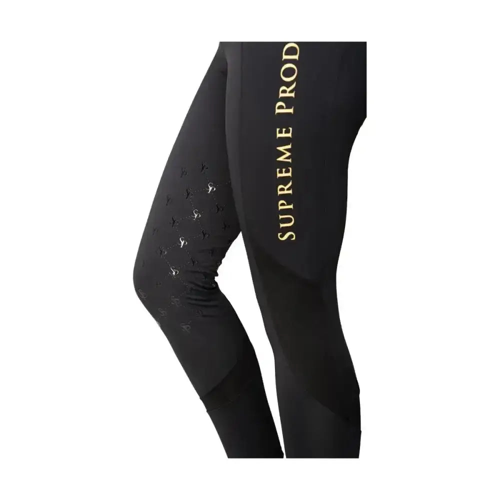 Black supreme products active rider leggings with gold lettering and perforated knee panels for a flattering fit