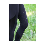 Black supreme products active rider leggings with subtle silver embellishments for a flattering fit on the thigh