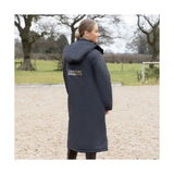 Dark navy blue insulated rider waterproof coat with hood and supreme products active logo on back side