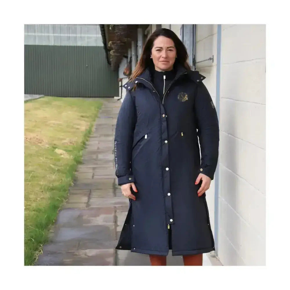 Navy blue insulated rider waterproof coat with hood front button closure and gold embroidery from supreme products active