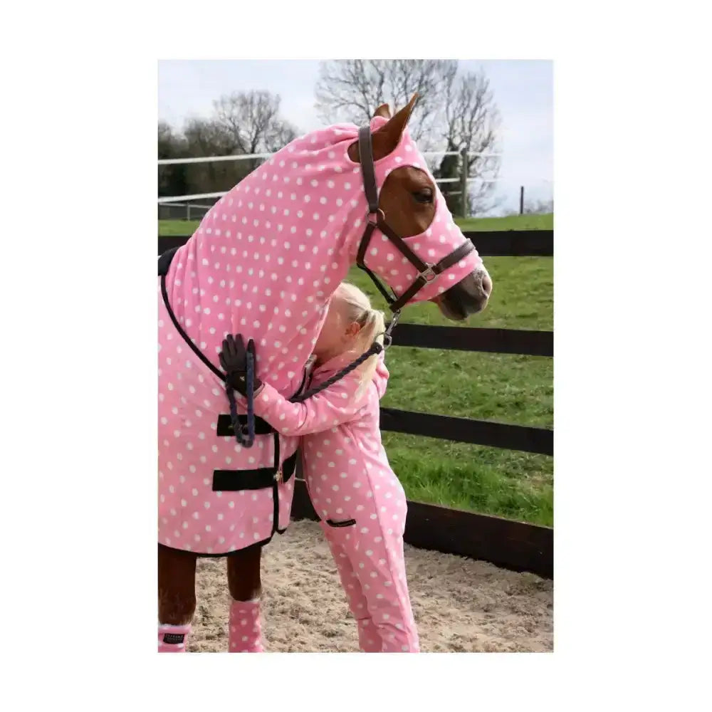 Pink polka-dot fleece horse blanket with black trim and adjustable straps for supreme products child’s dotty fleece onesie