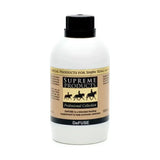 White plastic bottle with black cap and tan label of supreme products defuse vitamin based supplement for calm nervous animals