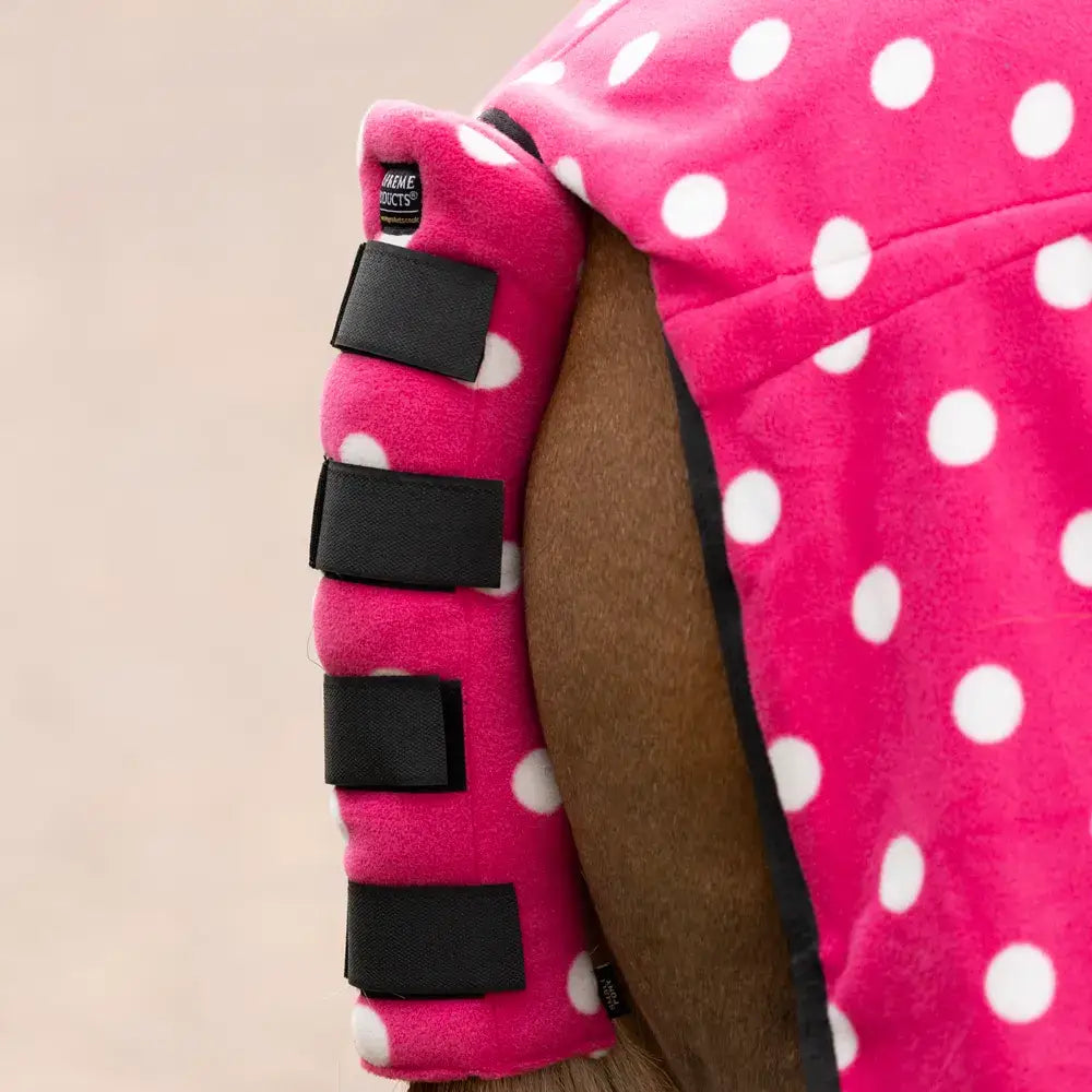 Pink polka-dot fleece tail guard with black velcro straps from supreme products dotty fleece tail series