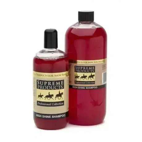 Two bottles of supreme products professional high shine horse shampoo filled with vibrant red liquid and black caps