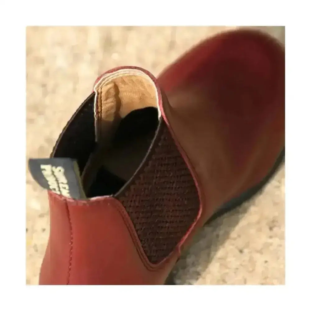 Supreme products ring jodhpur boots in oxblood leather with textured mesh panel and black interior lining for short riding