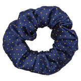 Supreme products show scrunchie navy blue fabric with ribbed texture and gold polka dots for hair scrunchies final touch