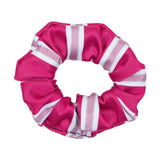 A vibrant pink and white striped ribbed fabric scrunchie by supreme products perfect for hair scrunchies or final touch ring attire