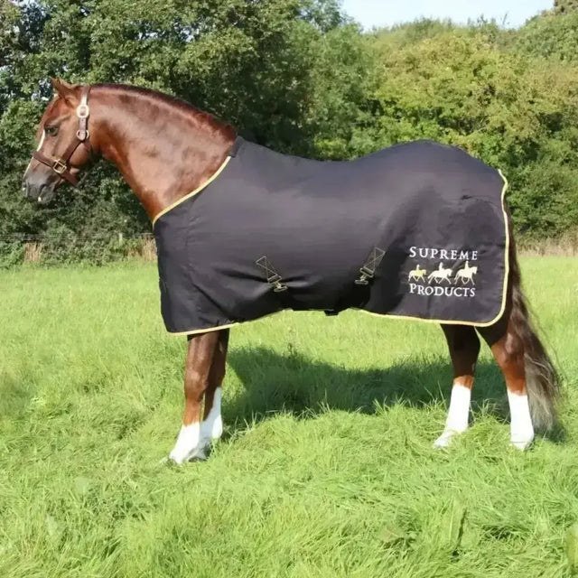 Black supreme products horse blanket with gold trim and embroidered logo perfect for fleece rugs and sheet perfect use