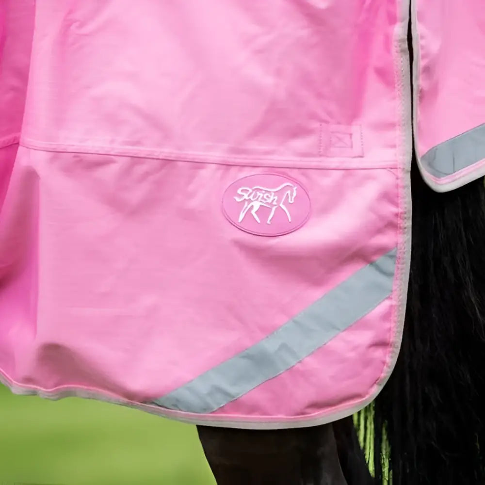 Baby pink turnout rug with detachable neck cover and 1200d outer liner attachments featuring white logo and gray trim