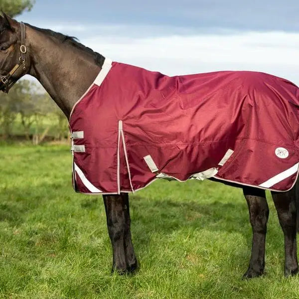 Maroon swish 100g detachable neck turnout rug with reflective strips and tail flap made from durable waterproof material