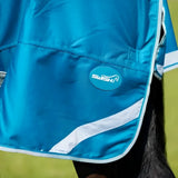 Bright blue swish 100g detachable neck turnout rug with shiny synthetic fabric white trim and circular logo patch