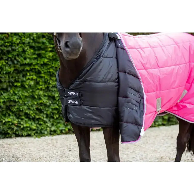 Pink and black quilted swish 100g horse rug liner with swish branded straps designed for highly breathable comfort