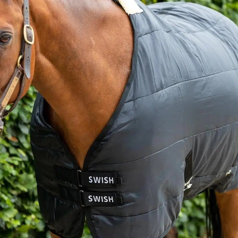 Black quilted swish 100g horse rug with adjustable cross surcingles perfect for use as a stable rug